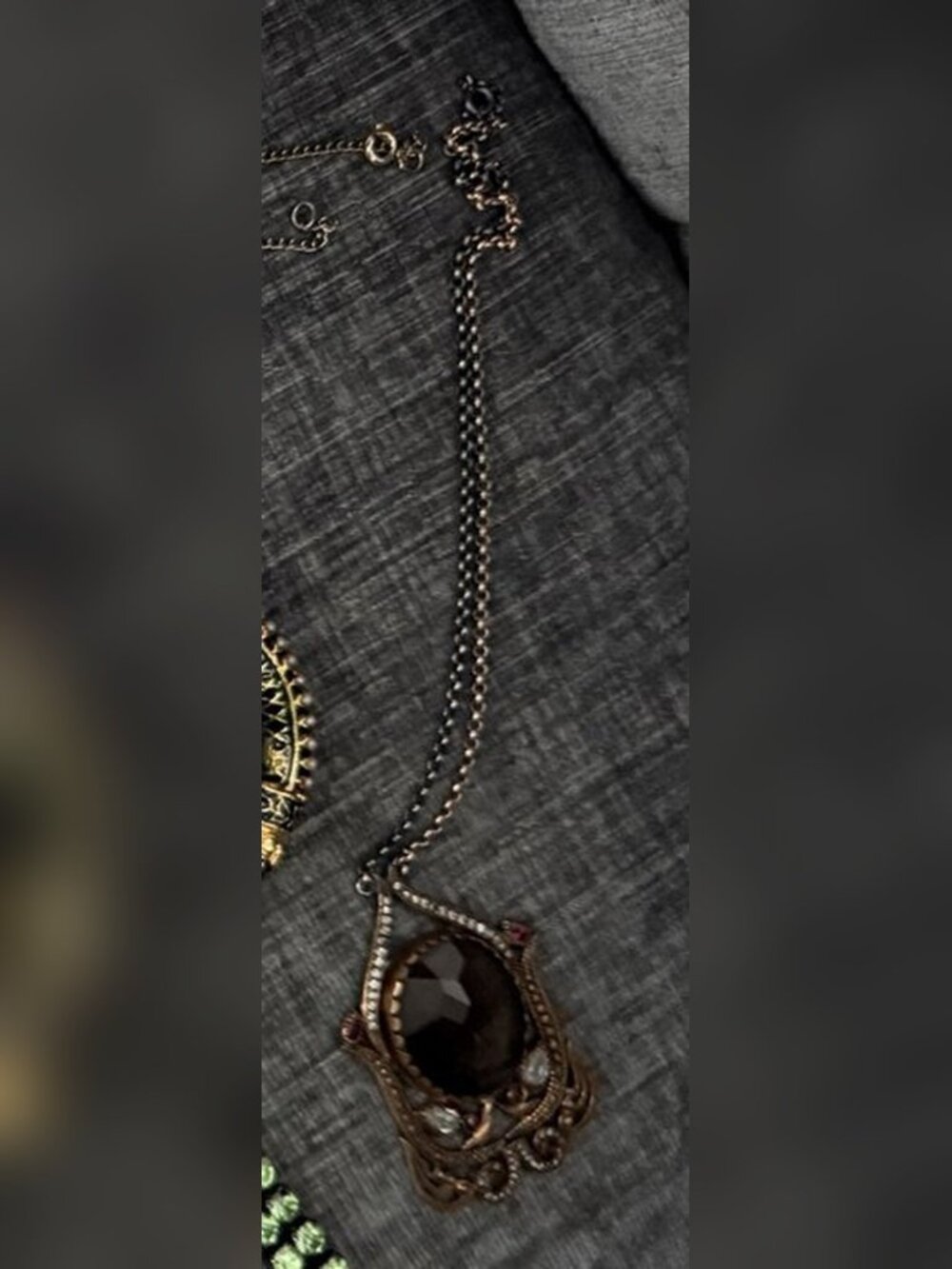 Ornate Brass Pendant with Smoky Stone